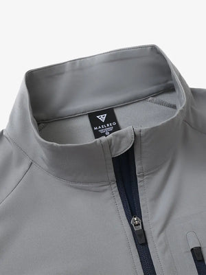 Detail view of the light grey windproof golf vest, highlighting the collar design and zippered closure.