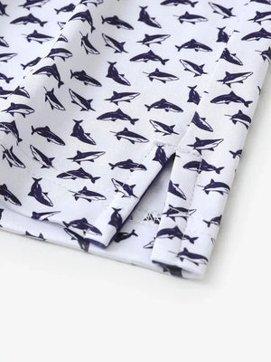 Detailed close-up of side hem slit on WHITE PURPLE SHARK Performance Print Boys Golf Polo for comfort