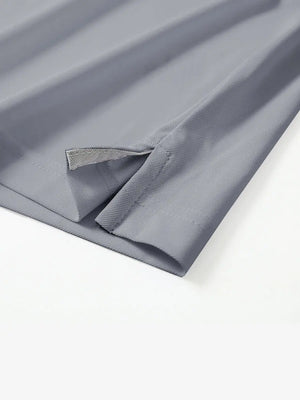 Detail shot of hem opening on LIGHT GREY Ventilated Pique Performance Polo