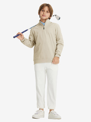 Full body model holding a golf club, styled in youth winter micro-fleece quarter zip pullover with light khaki