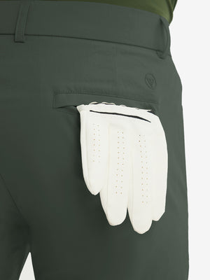 Close-up of the back pocket detail on the grey green stretch soft flat front dress golf shorts, emphasizing storage