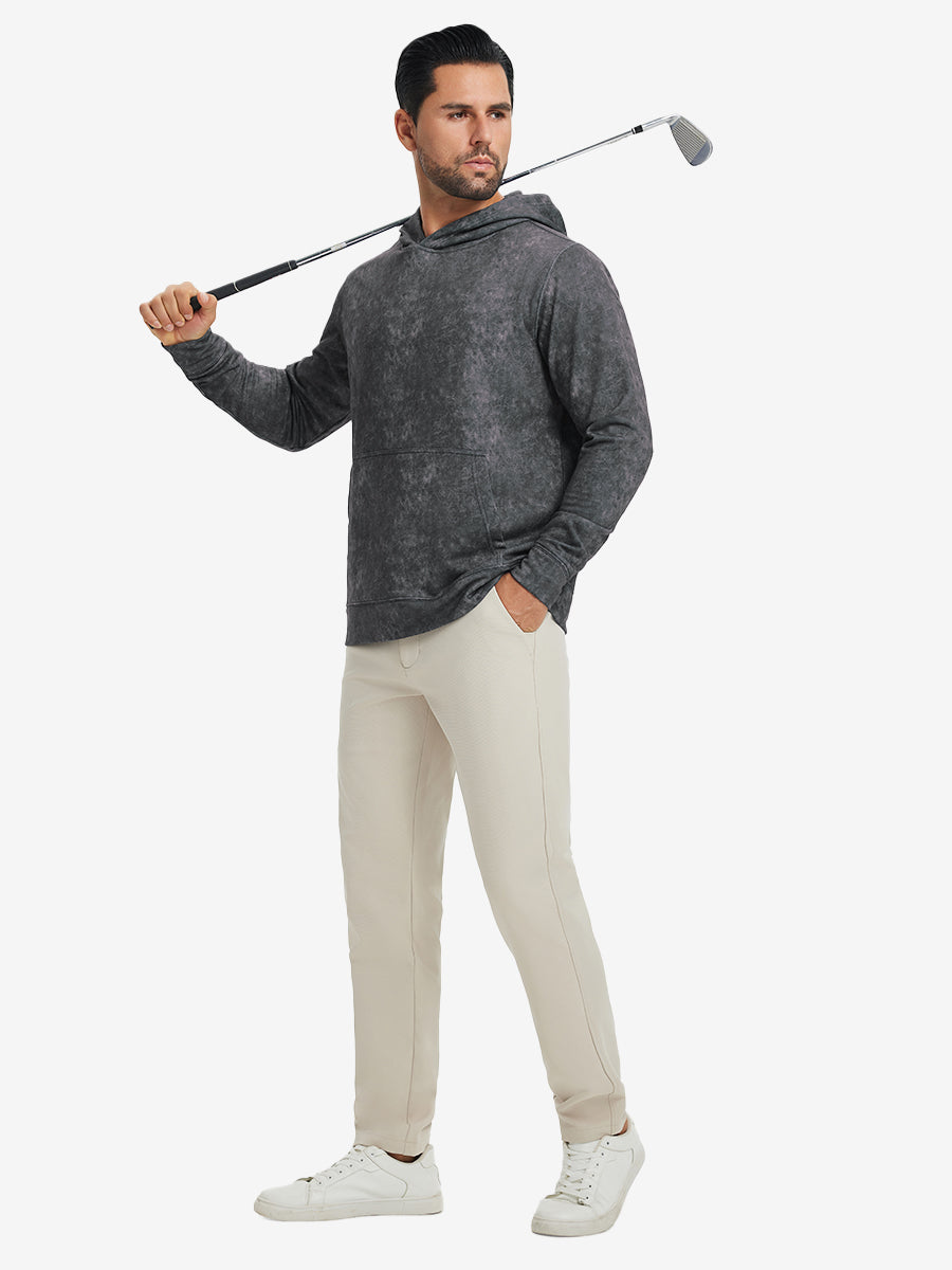 Full-body view of model in grey exclusive print kangaroo hoodies holding a golf club outdoors.