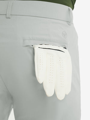 Close-up of the back pocket detail on the light grey stretch soft flat front dress golf shorts, emphasizing storage