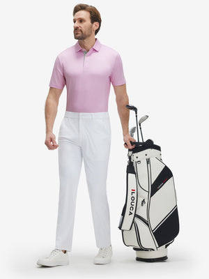 Full-body shot of model with a golf bag in pink white tee performance quick dry print golf polos