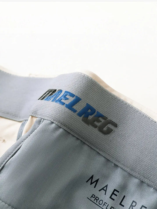 LIGHT KHAKI Water Resistant Everyday Pants close-up of waistband inner logo detail