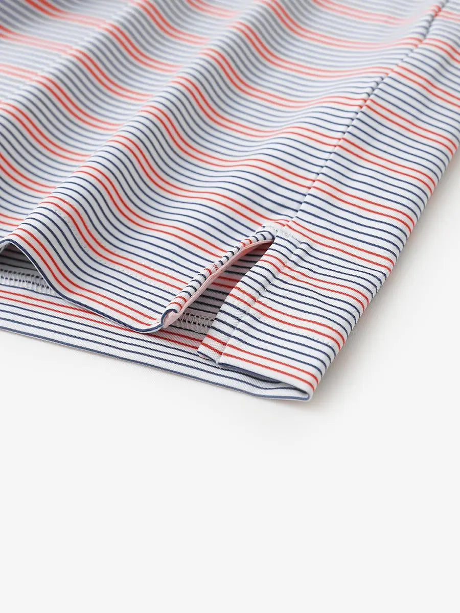 Close-up of side hem slit on Navy Red Stripe Performance Stripe Golf Shirt