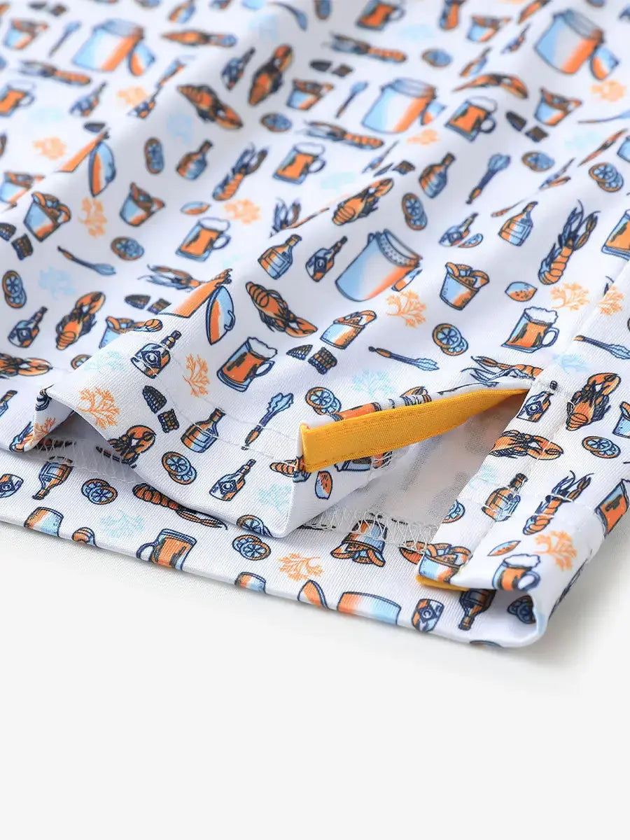 Hem slit detail of MAELREG Performance Jersey Print Polo in White Orange Picnic – comfort & movement
