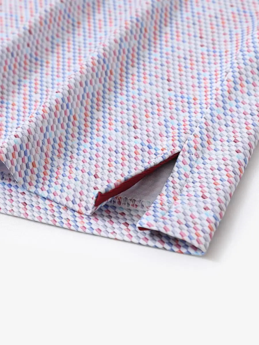Hem slit detail of MAELREG Performance Jersey Print Polo in Colourful Hexagon – comfort & movement