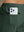 Back pocket detail of Water Resistant Comfy Fleece Golf Joggers in forest green, holding smartphone