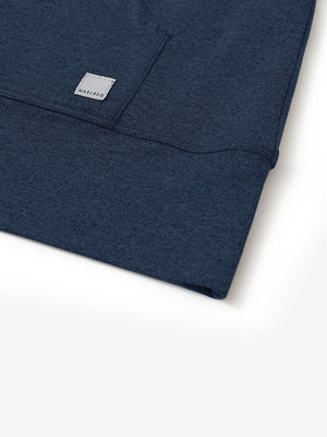 Hemline detail of the Quarter Zip Hoodie in Cobalt Heather, showing neat edges and fine craftsmanship.