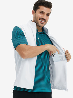 Close-up of water-resistant fleece golf vests pocket holding a phone, practical detail in white