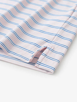 Close-up of side hem slit on Light Pink Cobalt Stripe Performance Stripe Golf Shirt