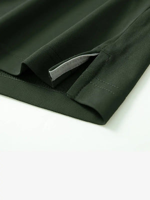 Detail shot of hem opening on OLIVE GREEN Ventilated Pique Performance Polo