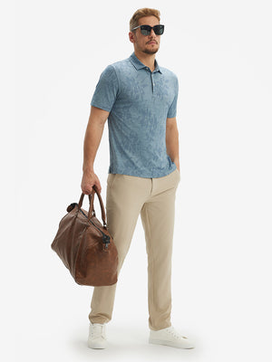 Full-body shot of model with a briefcase in blue flower breathable jacquard pattern 3-button golf polo