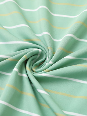 Close-up of light green stripe stylish stripe jersey golf polo fabric showing smooth texture and breathable knit.