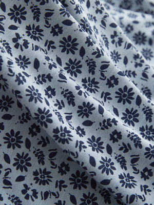 Fabric detail of Popular heather print polo with soft blended texture in glass grayish blue flower
