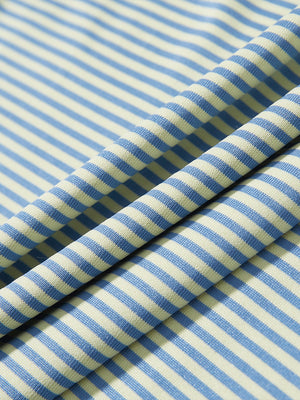 Fabric detail of Classic stripe polo shirts with crisp lines and smooth yellow stripe finish