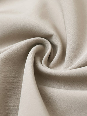 Fabric close-up of traditional breathable solid shirt, soft weave with airy dark khaki finish