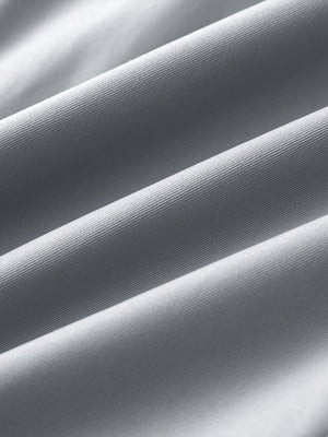 Material detail of Water resistant everyday pants showing smooth finish in glacier grey