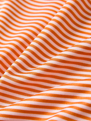 Fabric detail of Classic stripe polo shirts with crisp lines and smooth orange stripe finish