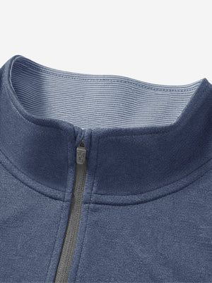 Collar detail close-up in colony blue melange lightweight sleeveless quarter zip golf vest