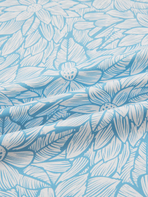 Close-up of blue artichoke full print lightweight quarter zip pullover fabric, soft and breathable texture