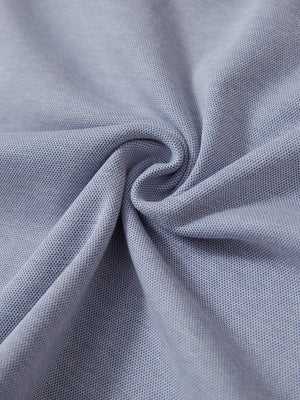 Fabric close-up showing the material of sky blue two tone pique cotton blend q-zip.