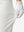 Detail view of stretch fabric on white women's regular fit stretchy golf pants