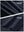 Close-up texture of navy blue women's moisture-wicking athletic tennis skirts fabric showing detailed outer and inner lining material.