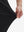 Detail view of pants elasticity on black flat front golf joggers pants with belt loops