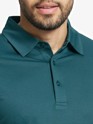 Close-up front view from nose to chest wearing TURQUOISE Performance Ananas Jacquard Polo