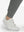 Detail view of hem on iron grey flat front golf joggers pants with belt loops
