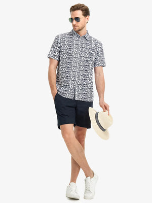 Full-body front view holding a takeaway drink cup, wearing BLACK WHITE GLASSES Stylish Printing Summer Shirt.