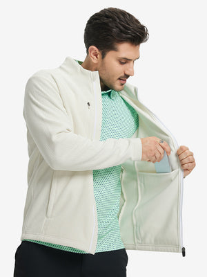 Model front half body lifting jacket, hand in inner pocket, textured insulated winter jacket, beige.