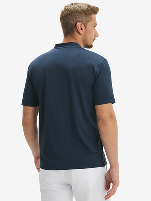 Side-back half-body view of model in navy moisture-wicking short sleeve henley shirt