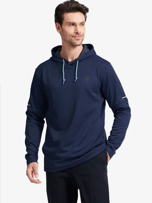 Model in half-body front pose styled with Navy Heather hoodie, showcasing relaxed fleece fit