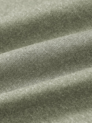Close-up of dark khaki melange moisture wicking quarter zip pullover fabric texture