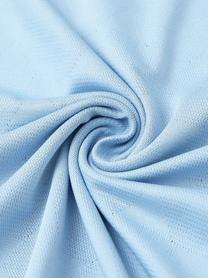 Close-up of sky blue modern texture stylish polo fabric showing surface detail.